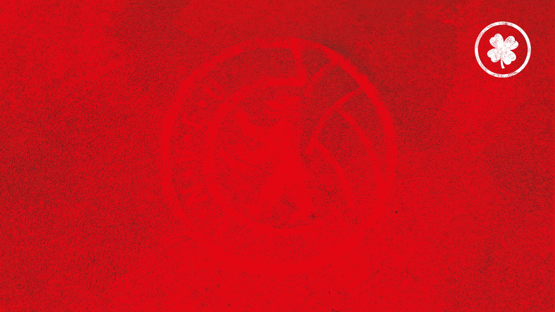 Roter Hintergrund mit einem schwachen, kreisförmigen Logo und einem weißen Kleeblatt-Symbol in der oberen rechten Ecke.