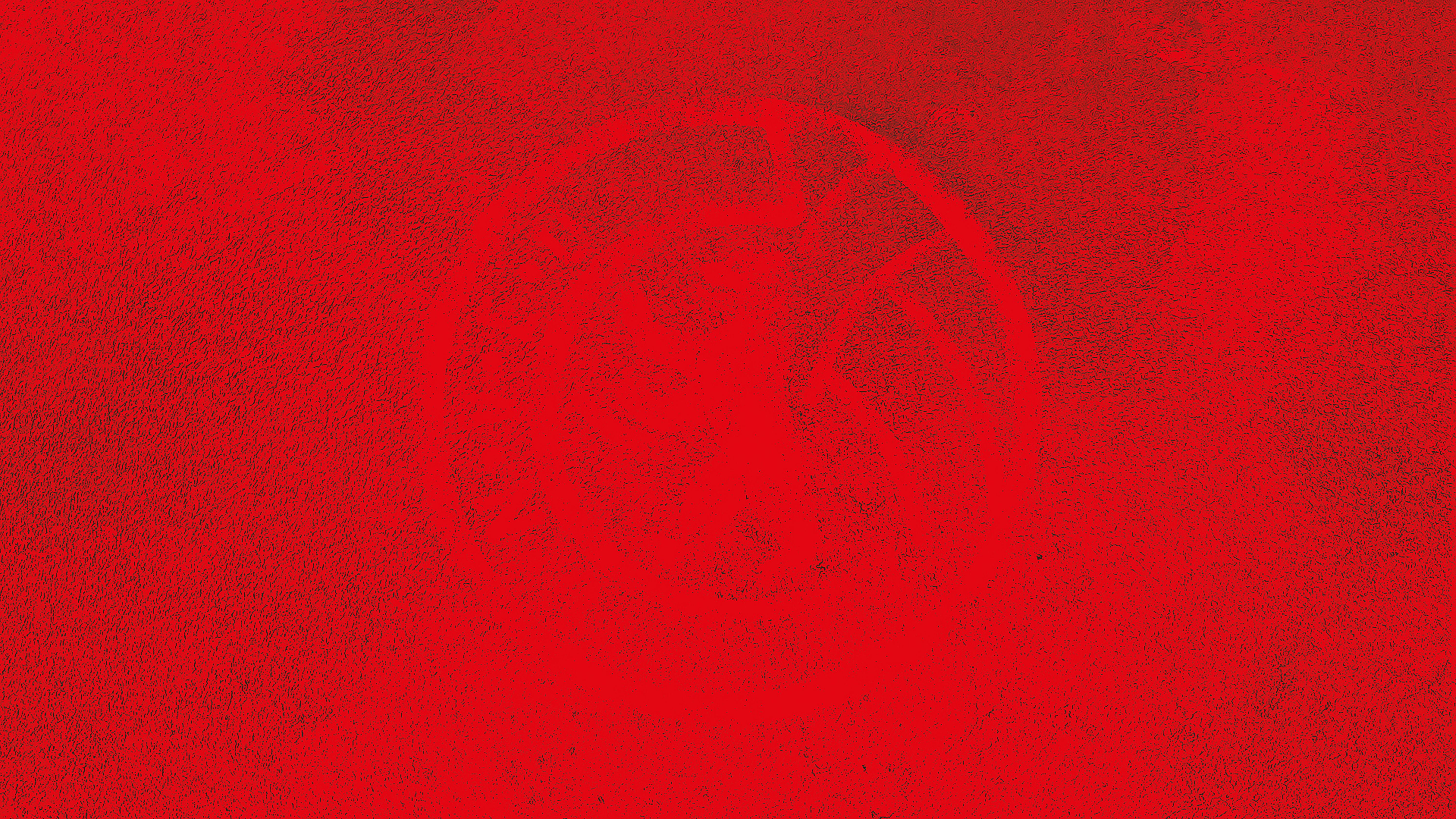 Ein rotes Megafon auf einem weißen Hintergrund.
