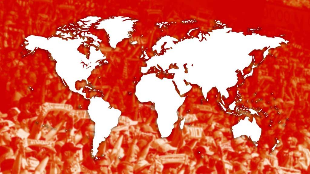 World map in white on a red background, surrounded by a crowd of people raising their hands.